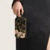 Abend-Clutch mit Blumenstickereien und Schleife