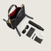 Kleine Snatch-Tasche aus genarbtem Leder Kleine Snatch-Tasche aus genarbtem Leder