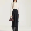 Mini-Pinch-Tasche aus genarbtem Leder Mini-Pinch-Tasche aus genarbtem Leder
